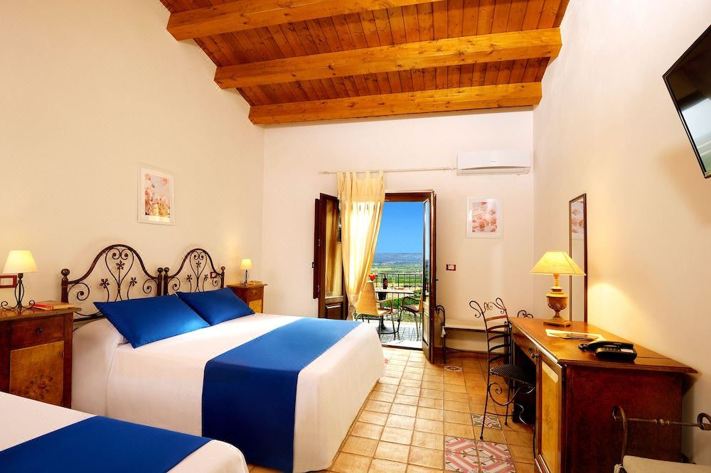 Photo of Bedroom in Fattoria di Torresena