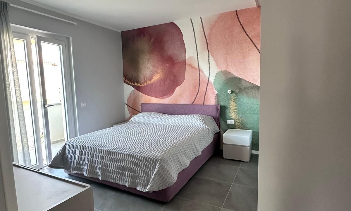 Photo of Bedroom in Gallico Marina