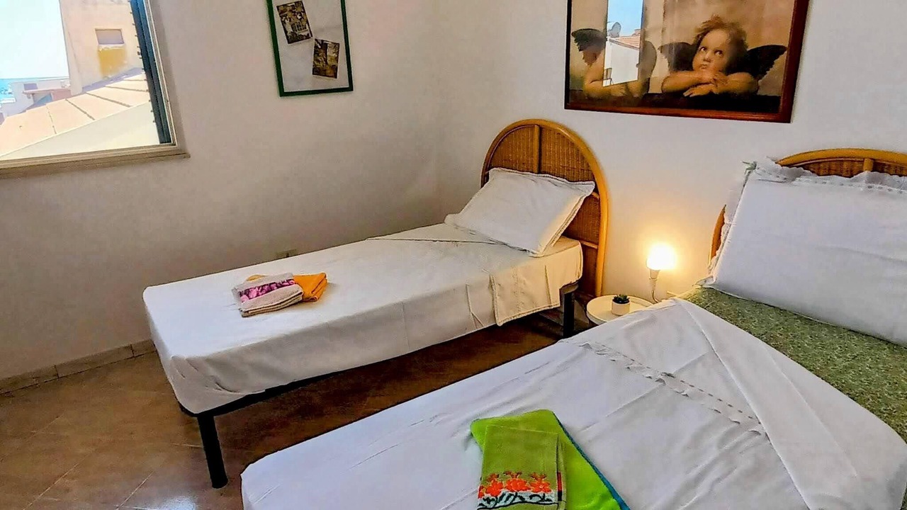 Photo of Bedroom in Punta Braccetto