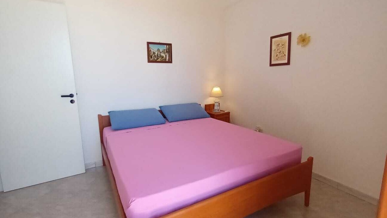 Photo of Bedroom in Punta Braccetto
