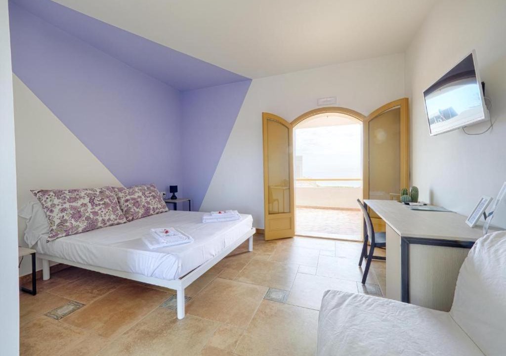 Photo of Bedroom in Punta Braccetto