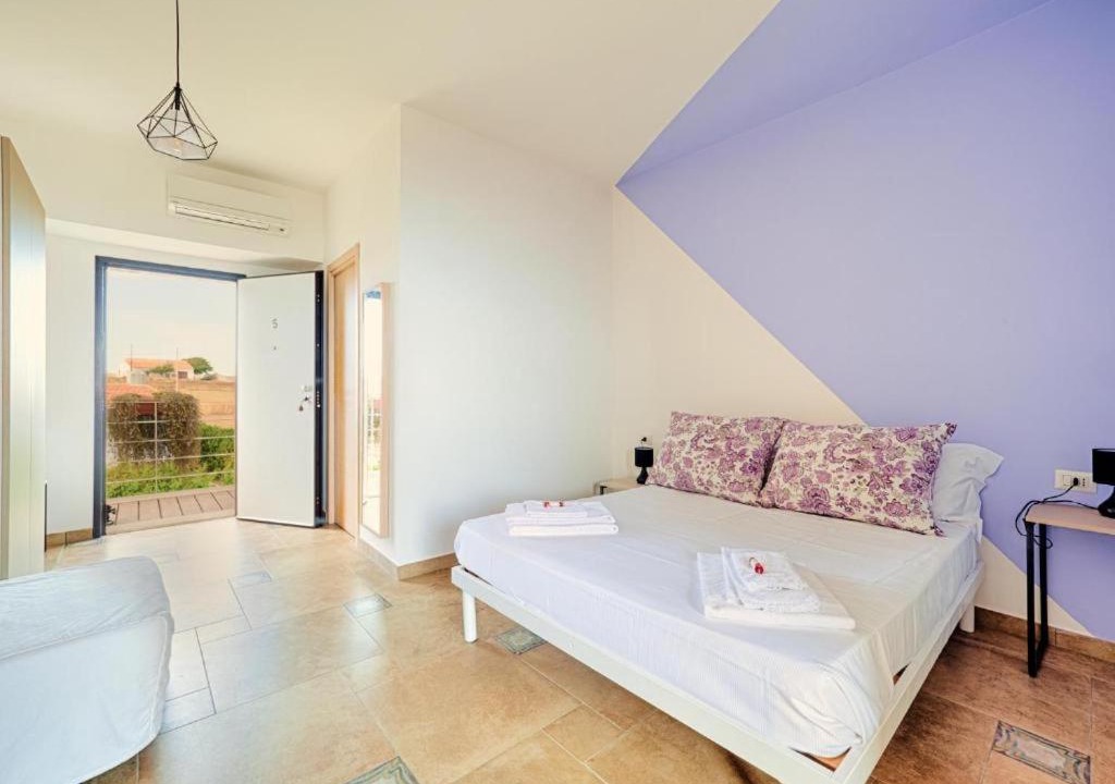 Photo of Bedroom in Punta Braccetto
