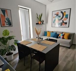 One-Bedroom Apartment with Balcony and City View