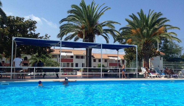 Holiday Apartment "Trilocale 30 Residence La Giungla" with Sea View, Shared Pool & Wi-Fi